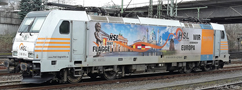 [Lokomotivy] → [Elektrické] → [BR 185] → 04925 E: elektrická lokomotiva s reklamním potiskem „HSL Logistik GmbH“