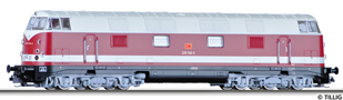[Lokomotivy] → [Motorové] → [V 180 (BR 118)] → 02699: dieselová lokomotiva červená-slonová kost s pruhem a černým rámem, šedé podvozky
