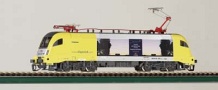 [Lokomotivy] → [Elektrické] → [BR 182 Taurus] → 47414: elektricKá lokomotiva žlutá s reklamou PEG (Prignitzer Eisenbahn GmbH)