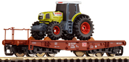 [Nákladní vozy] → [Nízkostěnné] → [4-osé plošinové] → 37576: plošinový vůz červenohnědý s nákladem traktoru